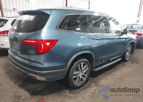 2017 Honda Pilot Touring z USA, uszkodzony, nr VIN 5FNYF6H96HB081123